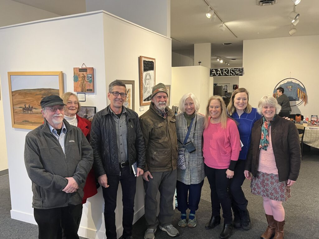 Jess Walter posing with Whatcom READS Art Challenge participants